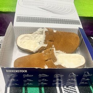 Birkenstock clog lined with lamb fur